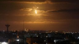A missile from Israel's Iron Dome air defence system, designed to intercept and destroy incoming short-range rockets and artillery shells, lights the sky in the central Gaza Strip, on April 21, 2022. (Photo by SAID KHATIB / AFP) (Photo by SAID KHATIB/AFP via Getty Images)