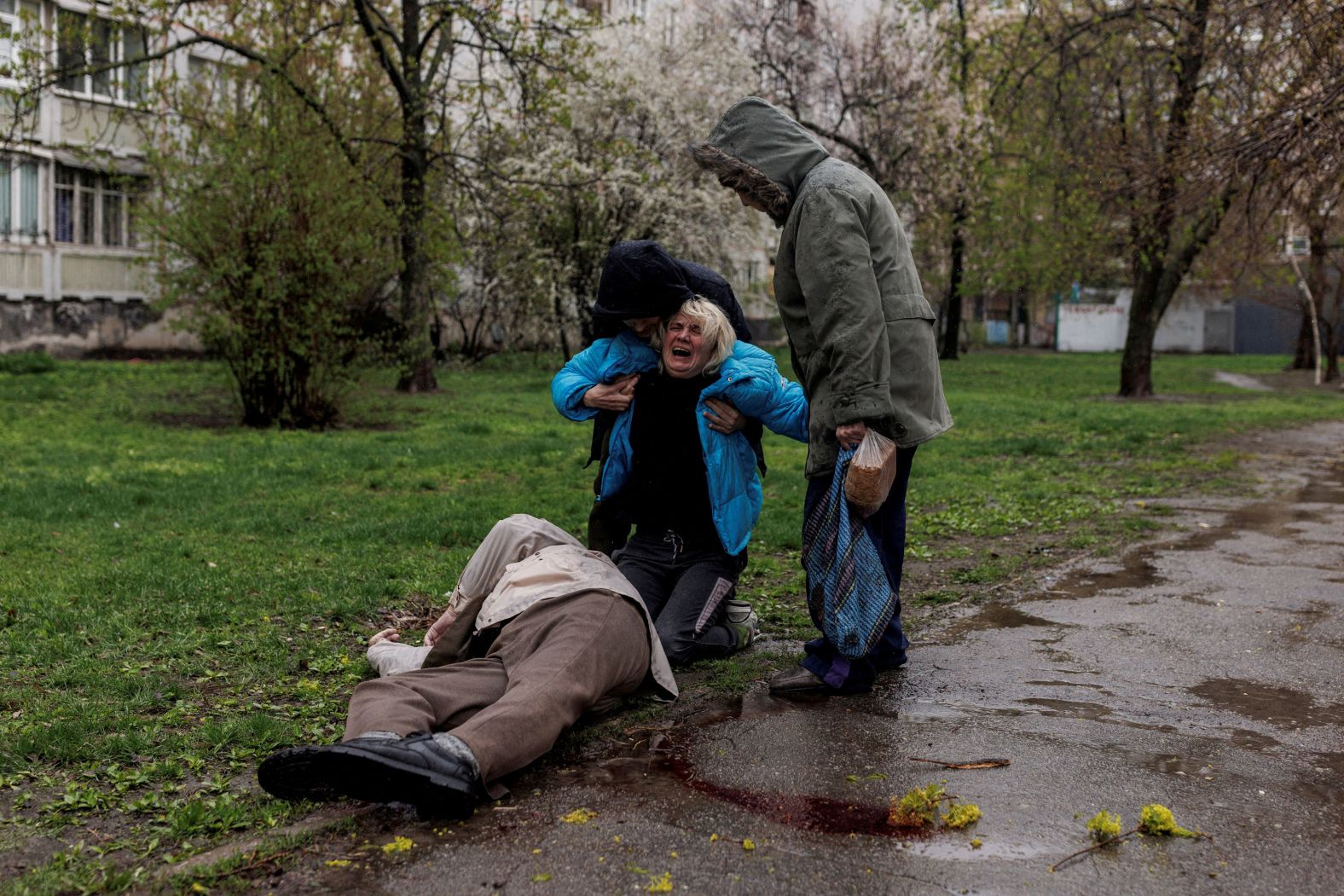 A woman mourns over the body of her father after Russian shelling in Kharkiv, Ukraine, on Monday, April 18. It has been nearly two months now since <a href="index.php?page=&url=http%3A%2F%2Fwww.cnn.com%2F2022%2F02%2F14%2Fworld%2Fgallery%2Fukraine-russia-crisis%2Findex.html" target="_blank">Russia invaded Ukraine,</a> and intense fighting continues.