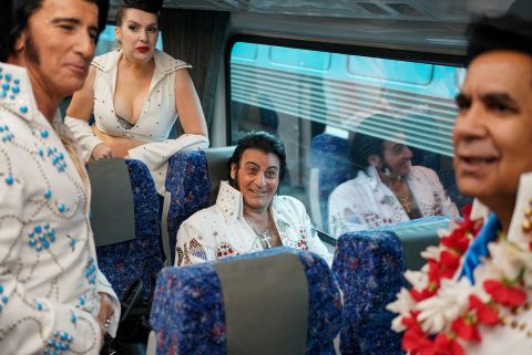 Elvis Presley impersonators board a train in Sydney before heading to the Parkes Elvis Festival on Thursday, April 21.