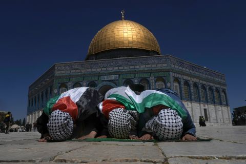 Muslims perform Friday prayers in front of the Al-Aqsa Mosque in Jerusalem on April 15. Before dawn that day, <a href="https://www.cnn.com/2021/05/21/middleeast/israel-palestinian-conflict-friday-intl/index.html" target="_blank">Israeli police clashed with Palestinians outside the mosque.</a>