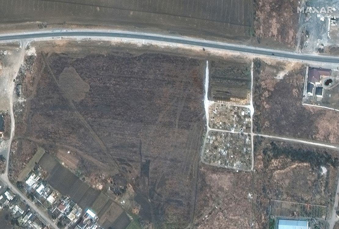 A satellite image from  March 23 shows a cemetery on edge of Manhush.