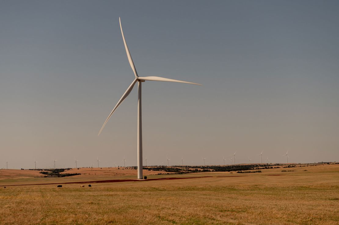 The morning sun illuminates a turbine near Weatherford.