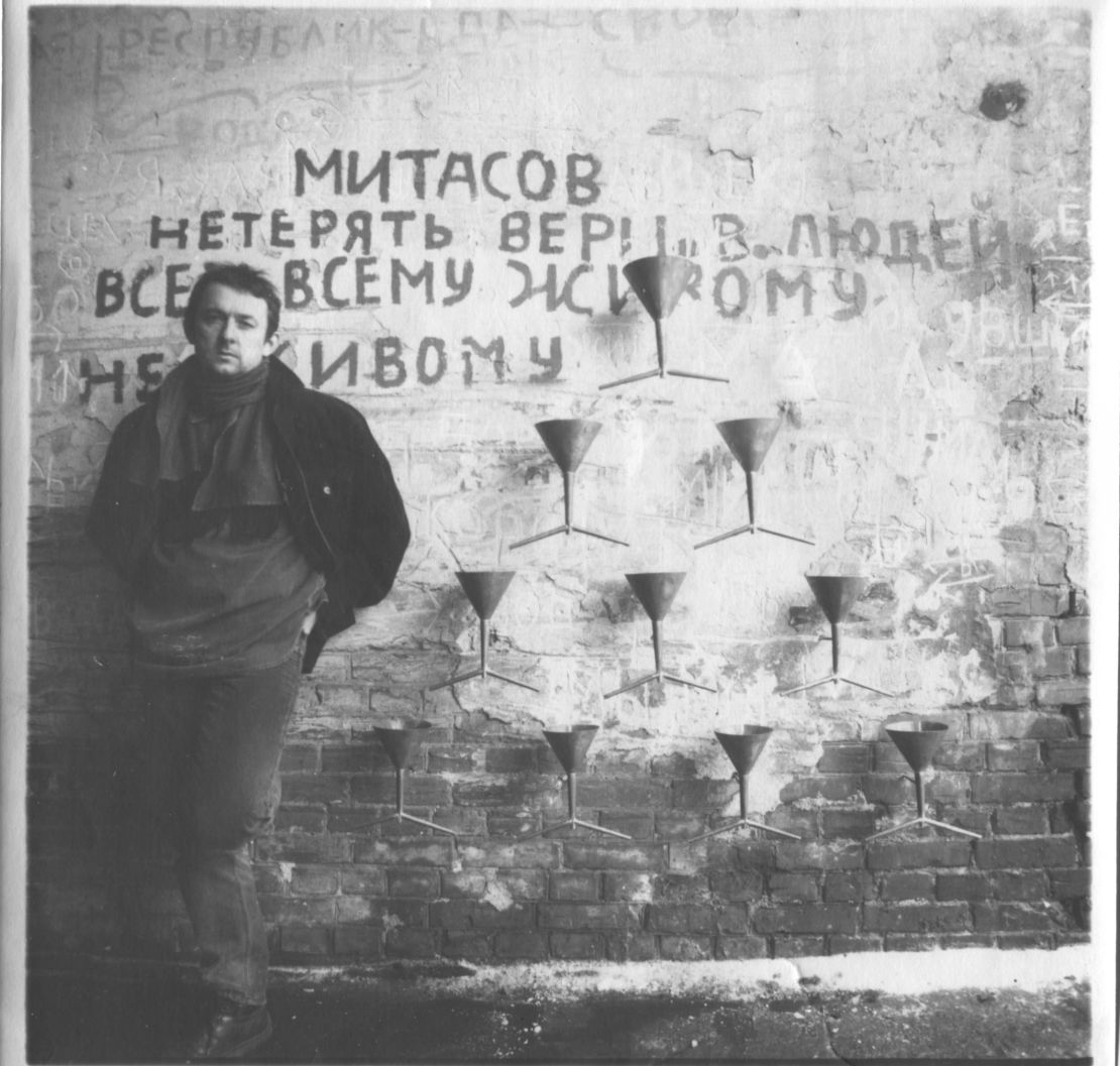 Pavlo Makov by a version of the 'Fountain of Exhaustion' mounted on the Oleh Mitasov's house in Kharkiv (1996)