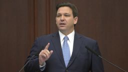 FILE - Florida Gov. Ron DeSantis addresses a joint session of a legislative session, Jan. 11, 2022, in Tallahassee, Fla. Florida Gov. DeSantis on Tuesday, April 19, asked the Legislature to repeal a law allowing Walt Disney World to operate a private government over its properties in the state, the latest salvo in a feud between the Republican and the media giant. (AP Photo/Phelan M. Ebenhack, File)