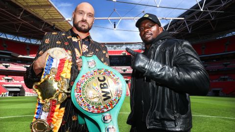 Tyson Fury, left, and Dillian Whyte, right, at the news conference prior to their WBC heavyweight championship fight at Wembley Stadium on April 20, 2022, in London, England.