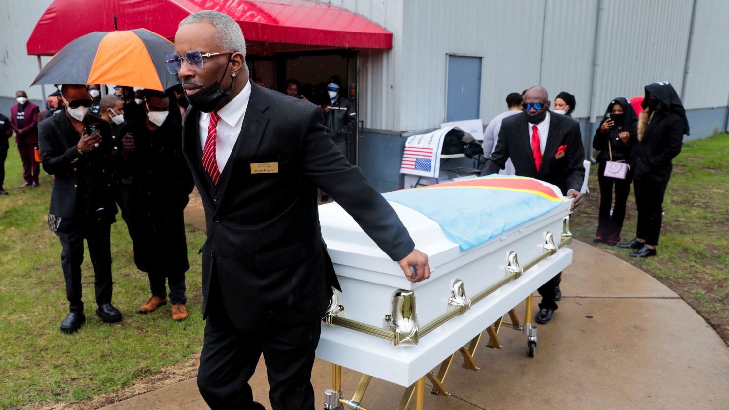 A casket with the remains of Patrick Lyoya is taken from the sanctuary following the funeral at Renaissance Church of God in Christ in Grand Rapids, Michigan.