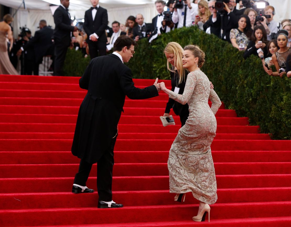 Johnny Depp and Amber Heard, then engaged, arrive at the Met Gala in 2014.