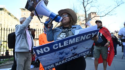 Protesters gather outside the US District Court for the Southern District of New York to call for justice against ex-president Juan Orlando Hernandez of Honduras, on April 22, 2022.