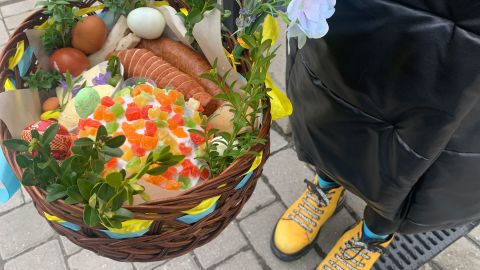 An Easter custom is to bring a basket of food to bless with holy water before going home to share with family. 