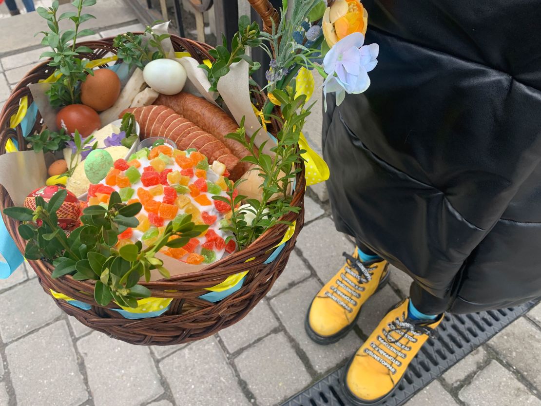 An Easter custom is to bring a basket of food to be blessed with Holy Water before returning home to share among family. 