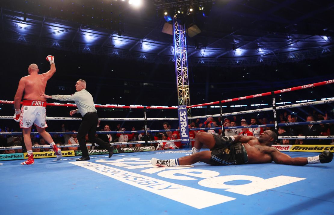 Whyte struggles to get to his feet after Fury landed the final uppercut.