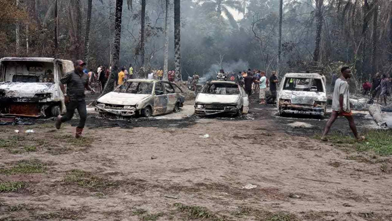 Damaged cars are seen following a blast at a Nigerian oil refinery on April 23, 2022, in this photo released by the Rivers State Command of the Nigeria Security and Civil Defence Corps. 
