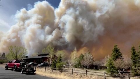 Smoke drifts from the Tunnel Fire north of Flagstaff, Arizona, April 19, 2022, in a still image from video. 
