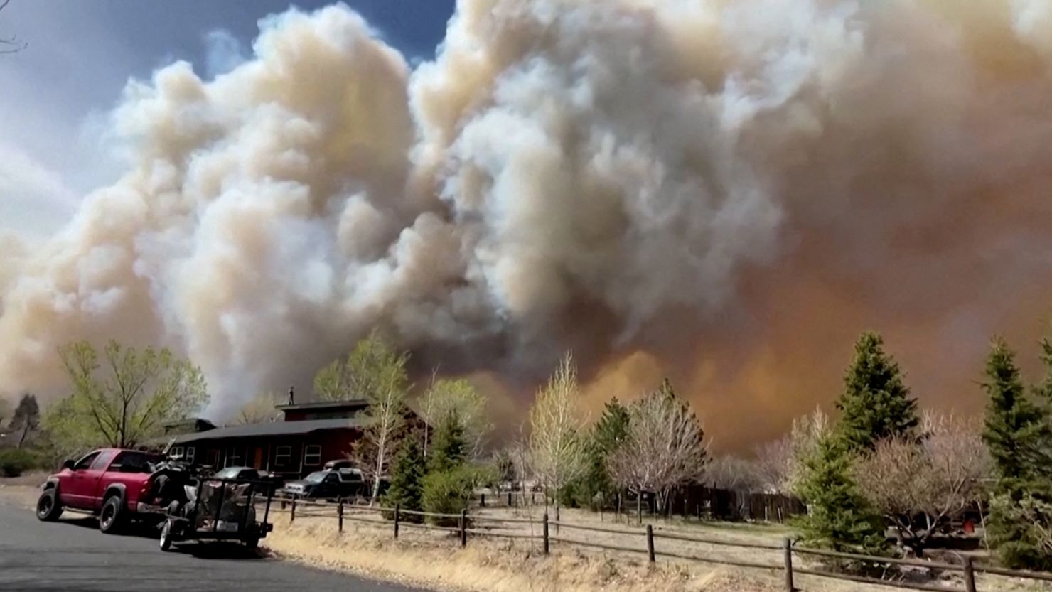 Smoke drifts from the Tunnel Fire north of Flagstaff, Arizona, April 19, 2022, in a still image from video. 