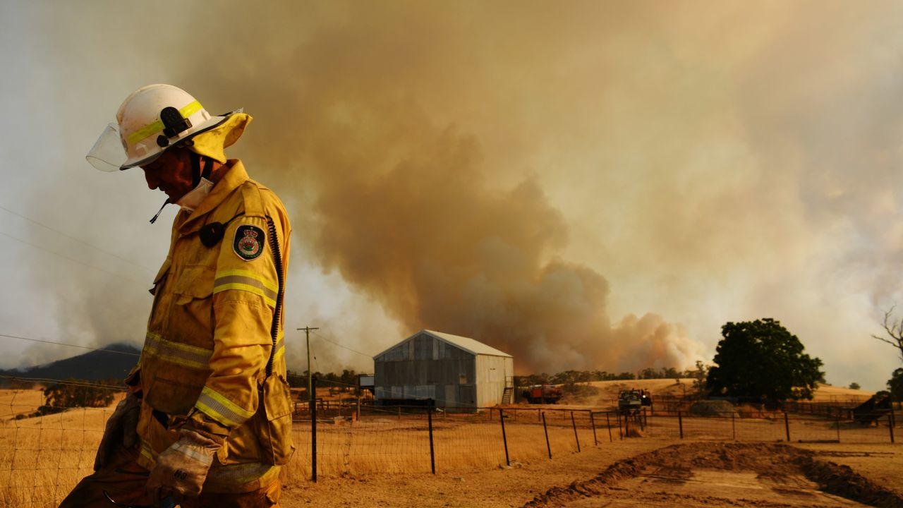 A volunteer firefighter on patrol during Australia's deadly 2019-2020 fire season.