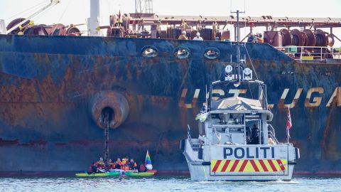 A police boat at the scene as members of Greenpeace stage a protest against the Ust Luga on Monday, April 25.