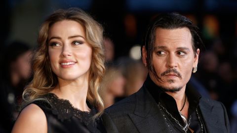 (From left) Amber Heard and Johnny Depp attend the 