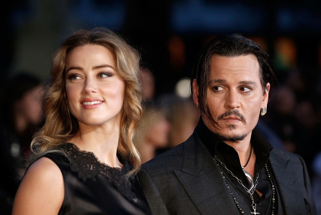 (From left) Amber Heard and Johnny Depp attend the "Black Mass" Virgin Atlantic Gala screening during the BFI London Film Festival on October 11, 2015.