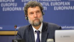 BRUSSELS, BELGIUM - DECEMBER 11:  Member of the International Peace and Reconciliation Initiative (IPRI) delegation to Turkey Osman Kavala is seen during a joint press conference with Chair of the Confederal Group of the European United Left - Nordic Green Left at the European Parliament Gabriele Zimmer, Chair of IPRI Judge Essa Moosa, French politician Francis Wurtz and Chair of the EU Turkey Civic Commission (EUTCC) Kariane Westrheim after 11th International Conference on the European Union, Turkey, the Middle East and the Kurds at European Parliament headquarters in Brussels, Belgium on December 11, 2014. (Photo by Dursun Aydemir/Anadolu Agency/Getty Images)