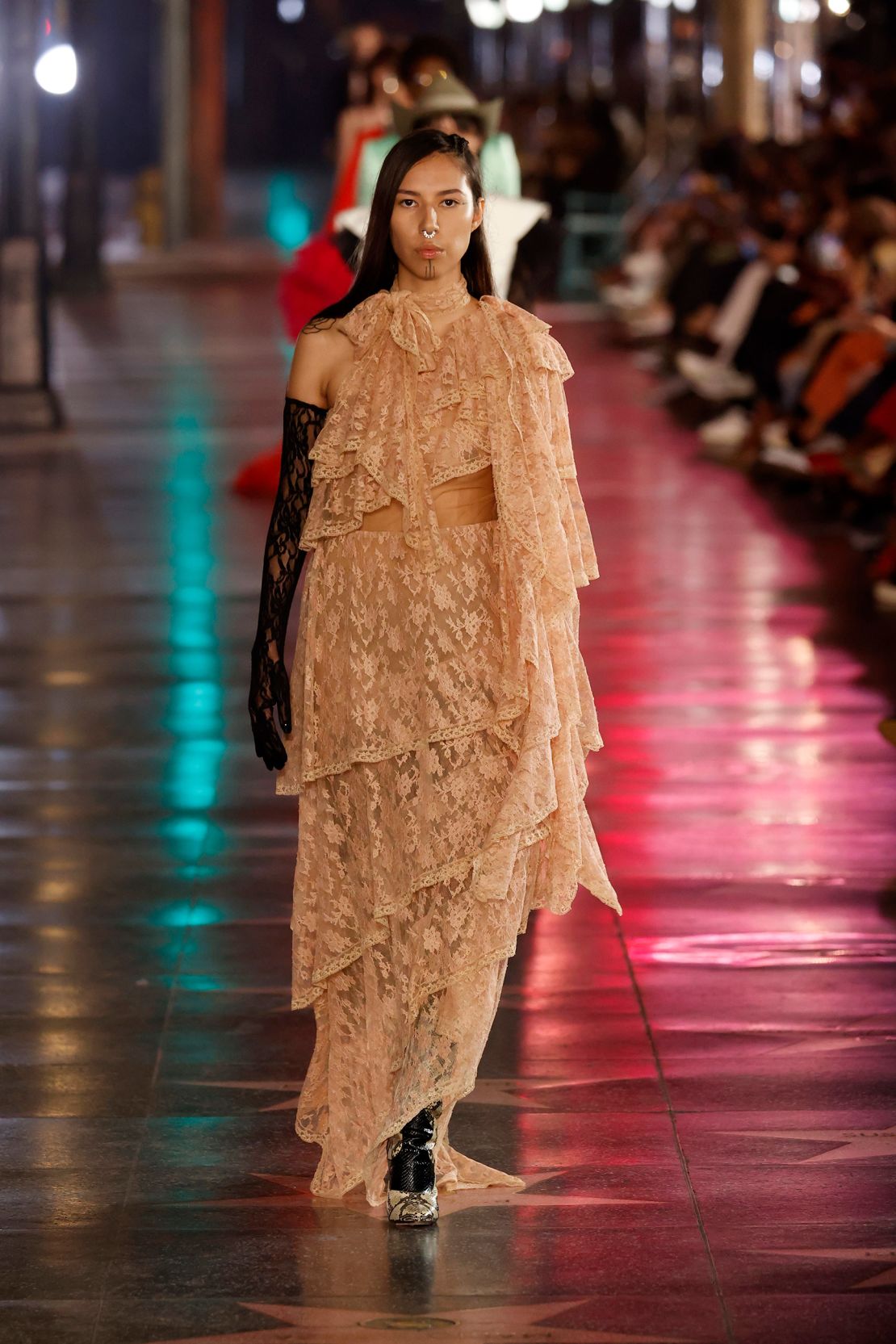 Chasinghorse walks the runway during Gucci Love Parade in Los Angeles.