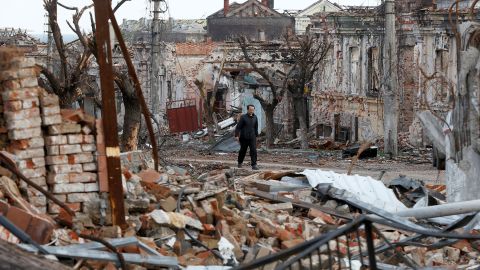 A man walks among the debris of the damaged southern port city of Mariupol, on April 22.