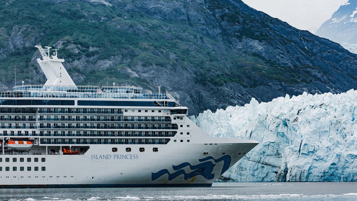 A cruise ship sails in front of Margerie Glacier in Glacier Bay, Alaska. Photo credit: Tim Rue/Bloomberg via Getty Images