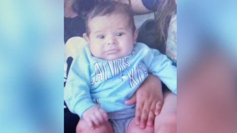 The baby, Brandon Cuellar, was last seen wearing a white long sleeve onesie with dinosaurs on it.