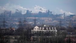 FILE - A metallurgical plant is seen on the outskirts of the city of Mariupol, Ukraine, Thursday, Feb. 24, 2022. Russia began evacuating its embassy in Kyiv, and Ukraine urged its citizens to leave Russia. Russian President Vladimir Putin ordered his forces not to storm the last remaining Ukrainian stronghold in the besieged city of Mariupol but to block it "so that not even a fly comes through." Defense Minister Sergei Shoigu told Putin on Thursday that the sprawling Azovstal steel plant where Ukrainian forces were holed up was "securely blocked." (AP Photo/Sergei Grits, File)