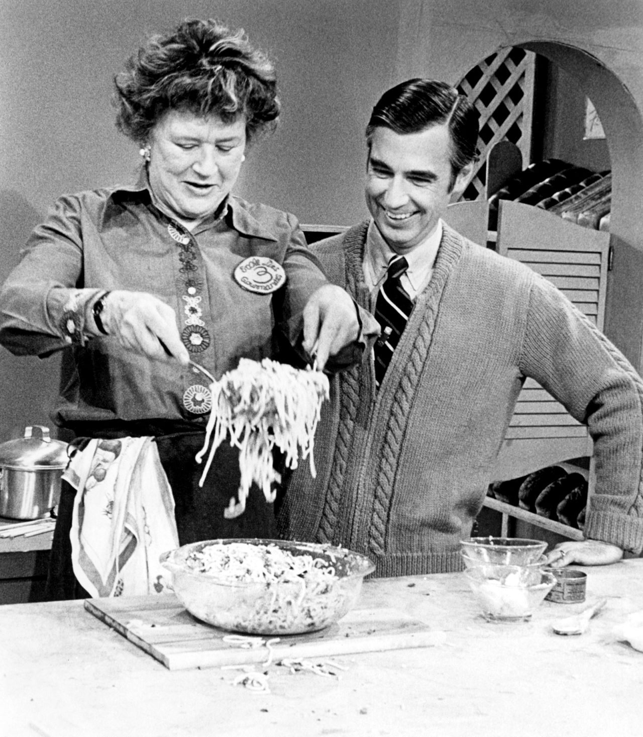 Child conducts a cooking demonstration with television personality Fred Rogers on "Mister Rogers' Neighborhood" in 1974. 