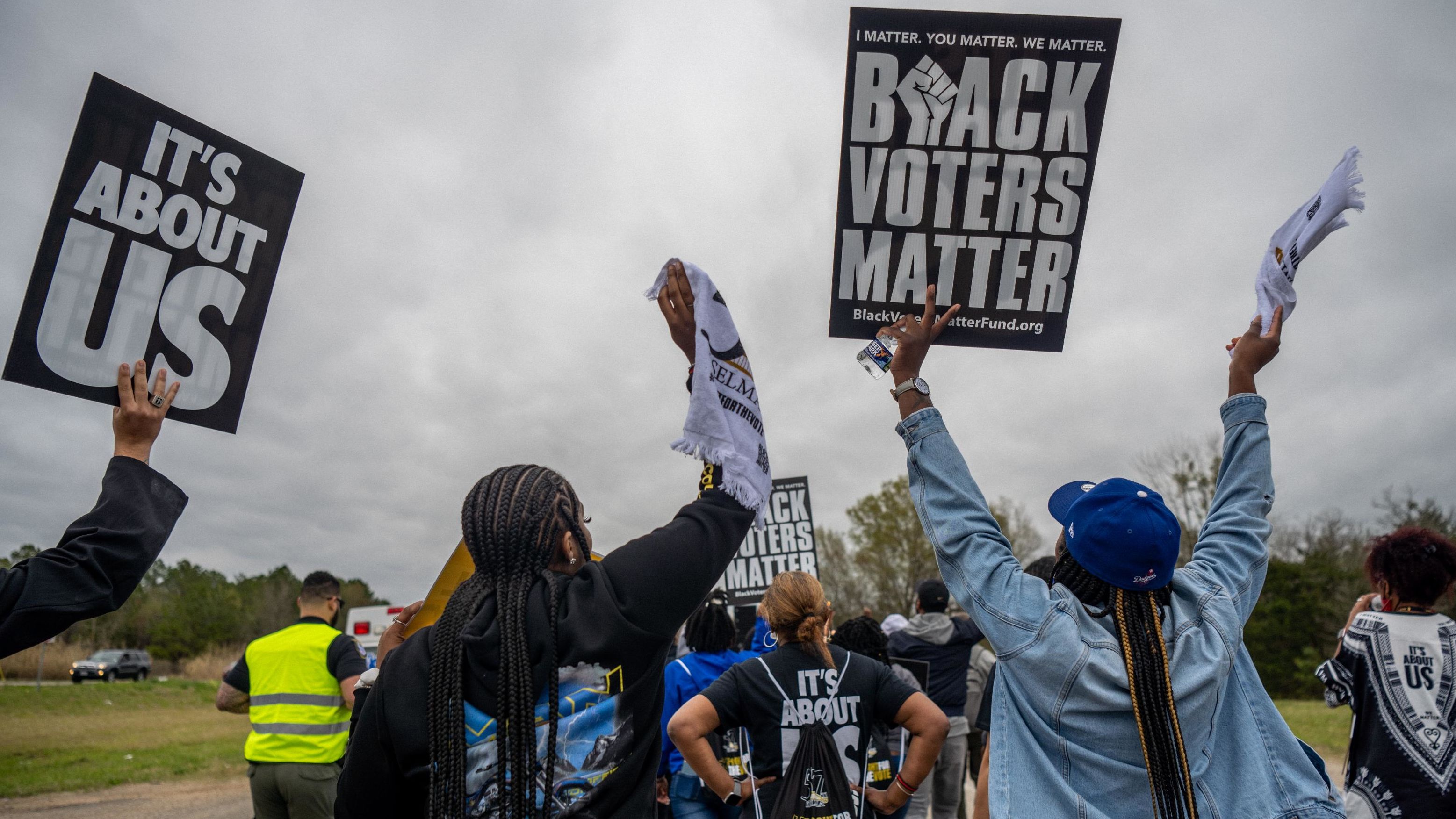 Participants demonstrate in Selma, Alabama, on March 9, 2022, during a march to mark the 57th anniversary of the 1965 Selma to Montgomery march.