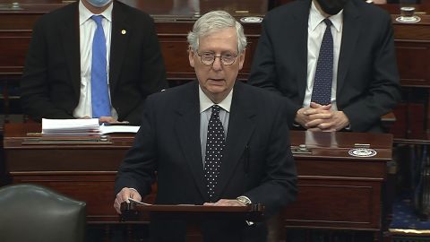 Senate Republican leader Mitch McConnell speaks as the Senate reconvenes after protesters stormed the US Capitol on Jan. 6, 2021.