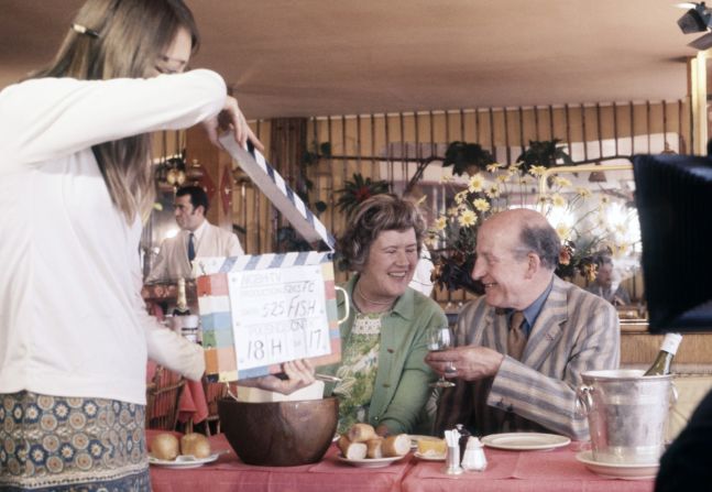 Child and her husband Paul shoot a segment for a cooking show in 1985.