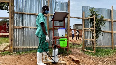 This file photo taken on March 21, 2021 shows a medical worker disinfecting a local Ebola treatment center in North Kivu province, northeastern Democratic Republic of the Congo DRC. 