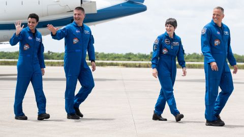 NASA astronauts Jessica Watkins, left, Kjell Lindgren, second from left, ESA (European Space Agency) astronaut Samantha Cristoforetti, second from right, and NASA astronaut Robert Hines, right, are seen as they depart the Launch and Landing Facility at NASA's Kennedy Space Center.