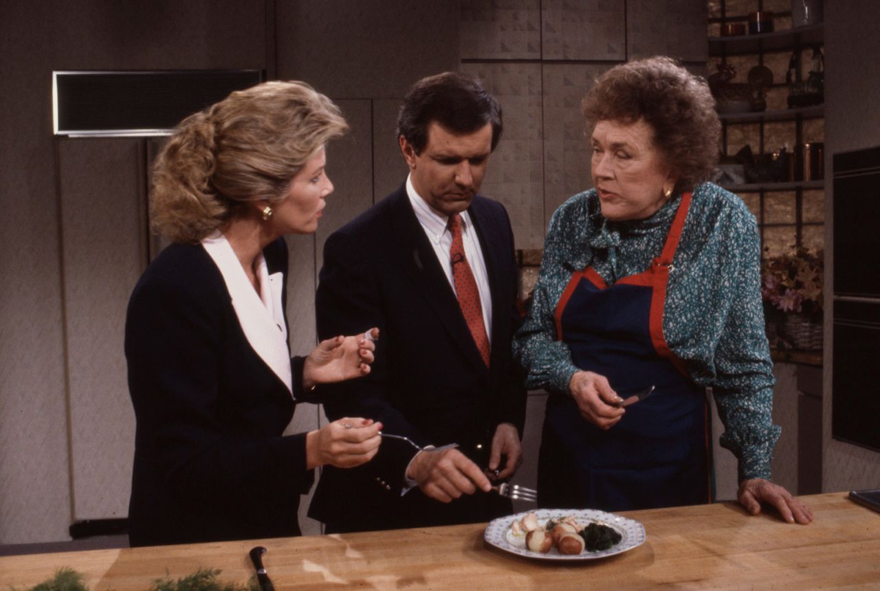 Joan Lunden, Charles Gibson and Child cook on ABC's "Good Morning America" in 1990. 