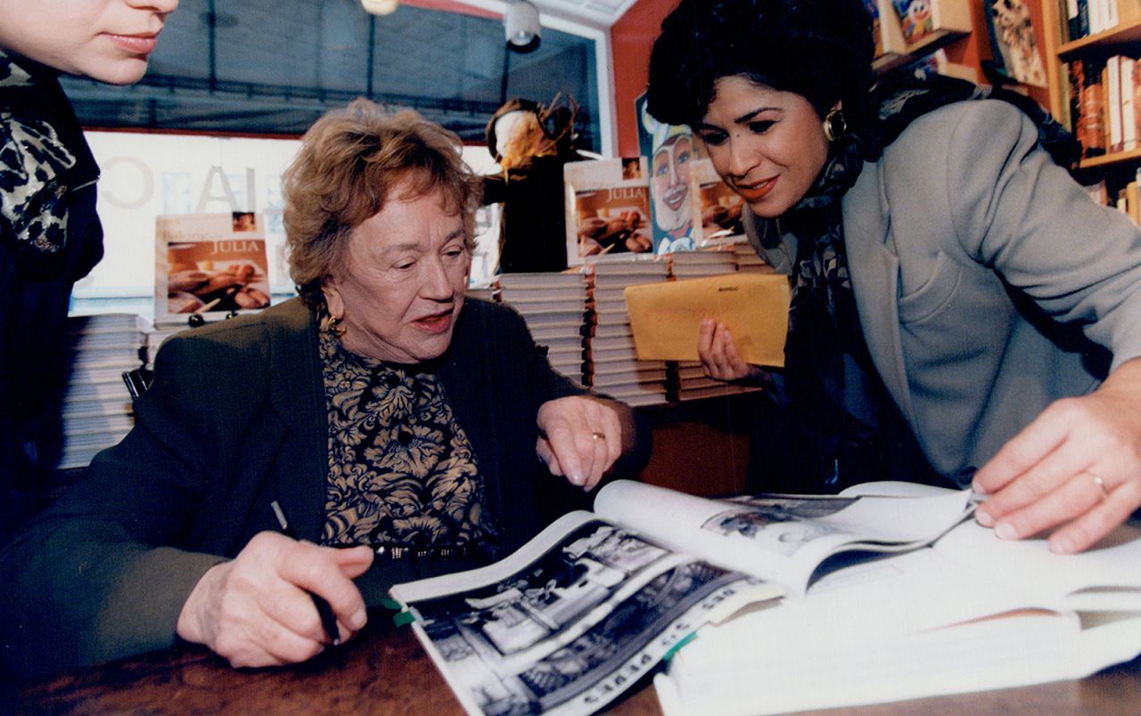 Child talks with fans at a book signing in Toronto in 1991. 