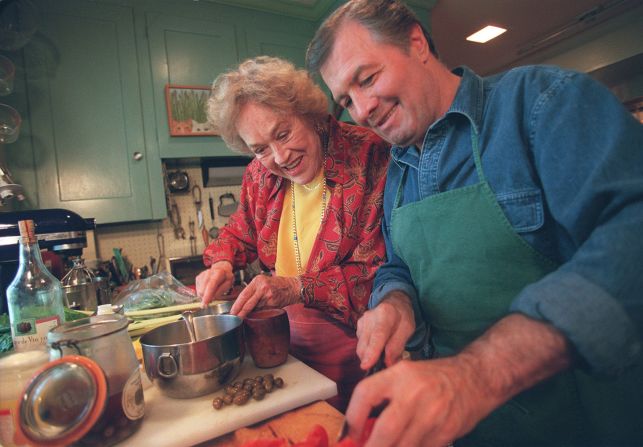 Child cooks with Jacques Pepin in her kitchen in Cambridge, Massachusetts, in 1998. The longtime friends shared a love of French food and even co-hosted a cooking show, "Julia & Jacques Cooking at Home," that aired on PBS in 1999.