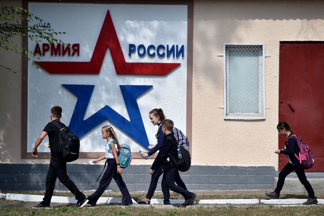 Children walk past the headquarters of the Operative Group of the Russian Troops in the town of Tiraspol last year.