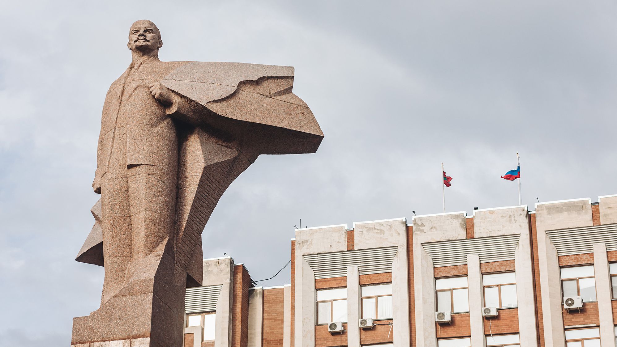 A statue of Vladimir Lenin in front of the Presidential Palace in Tiraspol.