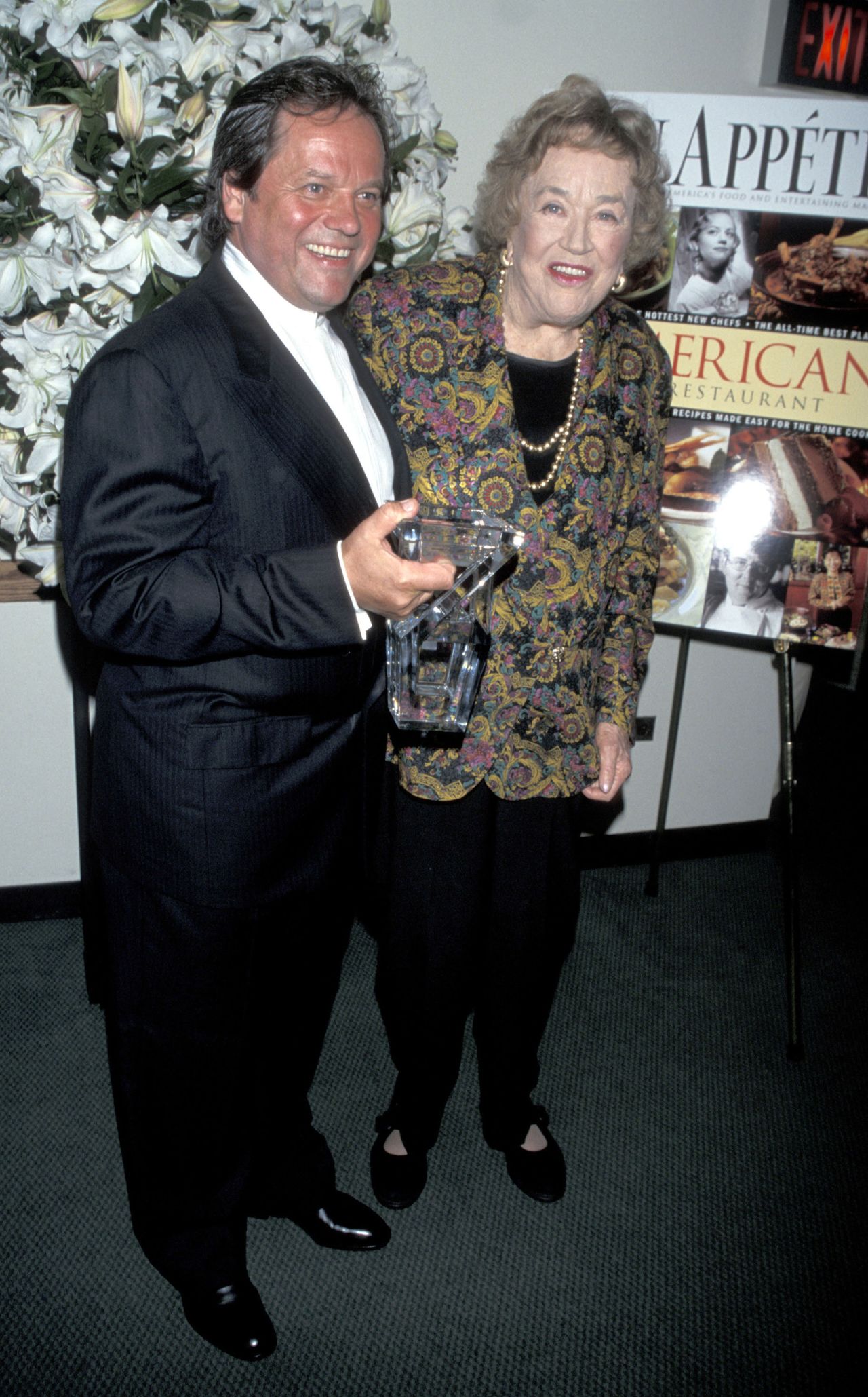 Child and chef Wolfgang Puck attend the Bon Appetit American Food and Entertaining Awards in New York in September 1998.