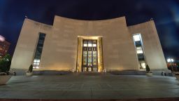 Central Brooklyn Public Library in New York City at night.