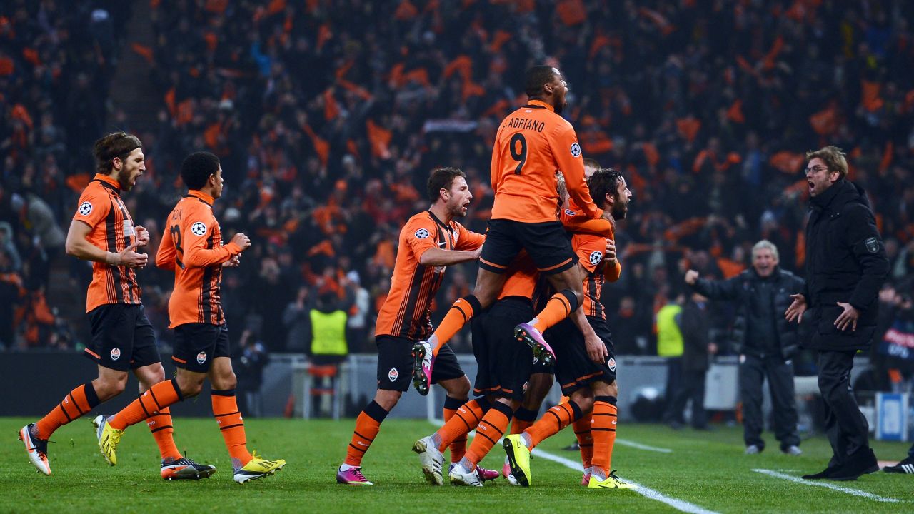 Darijo Srna celebrates after scoring against Borussia Dortmund in the Champions League at the Donbass Arena in 2013. The following year, Shakhtar was forced from its home.