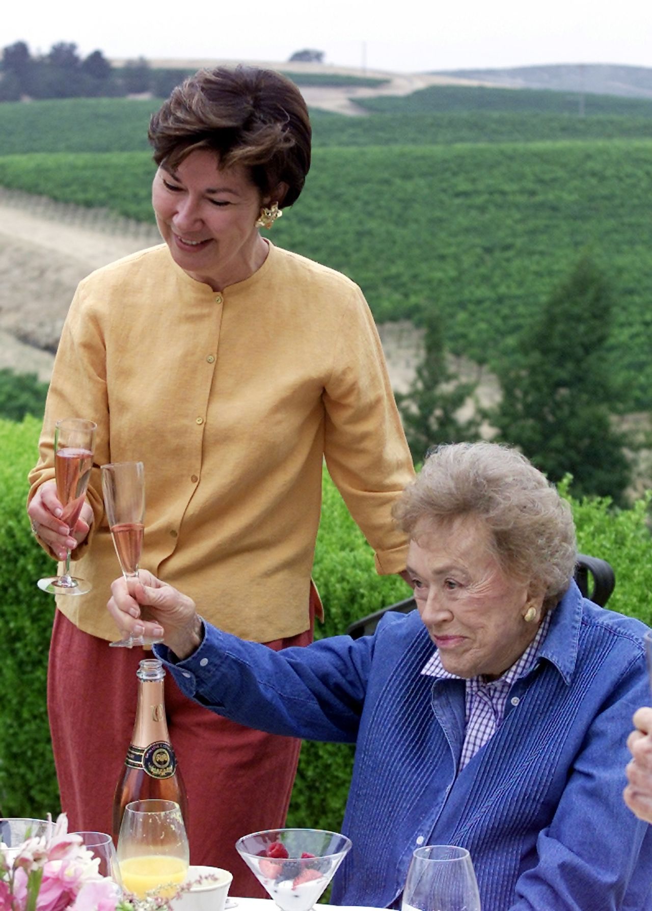 Child and winemaker Eileen Crane share a toast during a brunch to celebrate Child's 90th birthday in Napa, California, in 2002.