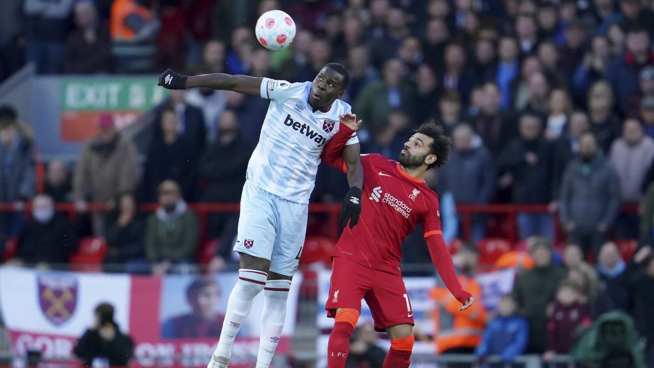 West Ham's Kurt Zouma, left, and Liverpool's Mohamed Salah fight for the ball during the English Premier League soccer match between Liverpool and West Ham United at Anfield in March 2022. Bowen is an admirer of Salah's work ethic.