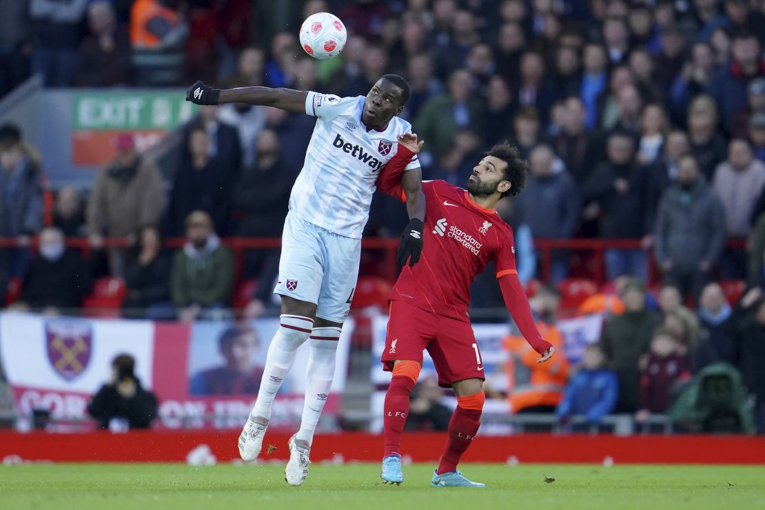 West Ham's Kurt Zouma, left, and Liverpool's Mohamed Salah fight for the ball during the English Premier League soccer match between Liverpool and West Ham United at Anfield in March 2022. Bowen is an admirer of Salah's work ethic.