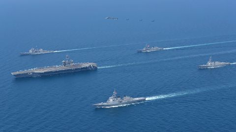 USS Abraham Lincoln, left, and JS Kongo, front, take part in a US-Japan joint exercise in the Sea of ​​Japan on April 12 