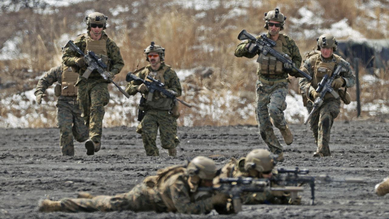 US Marines take part in a joint amphibious exercise with the Japan Ground Self-Defense Force amphibious rapid deployment unit at a training site near Mount Fuji in central Japan, on March 23.