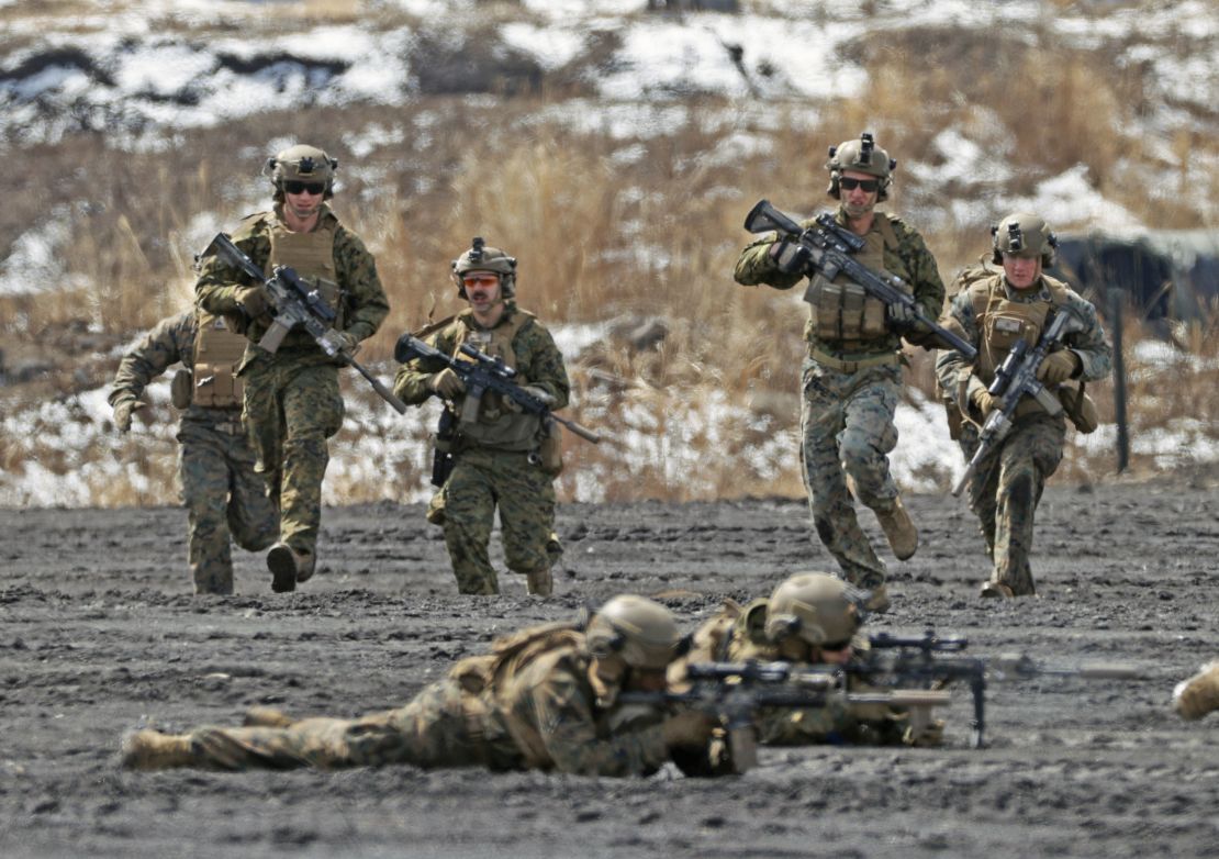 US Marines take part in a joint amphibious exercise with the Japan Ground Self-Defense Force amphibious rapid deployment unit at a training site near Mount Fuji in central Japan, on March 23. 