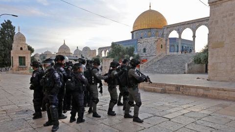 Israeli police and Palestinian demonstrators (not pictured) clash at Jerusalem's Al-Aqsa mosque compound after the morning prayer in east Jerusalem on April 22, on the third Friday of the holy month of the Ramadan.