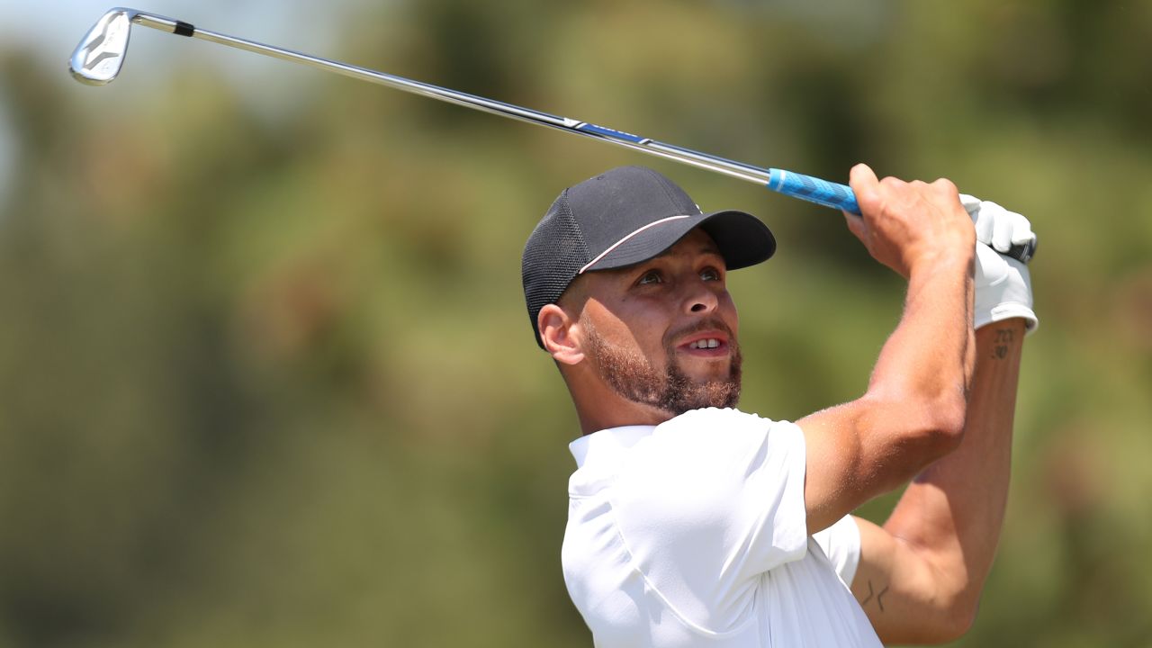 Steph Curry tees off during the American Century Championship at Edgewood Tahoe South golf course in July 2020.